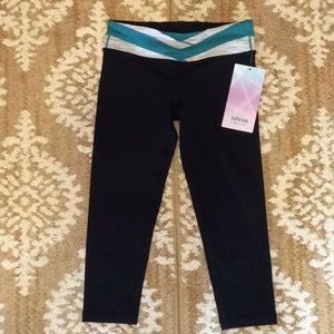Reversible Ivivva girls size 10 crop leggings.